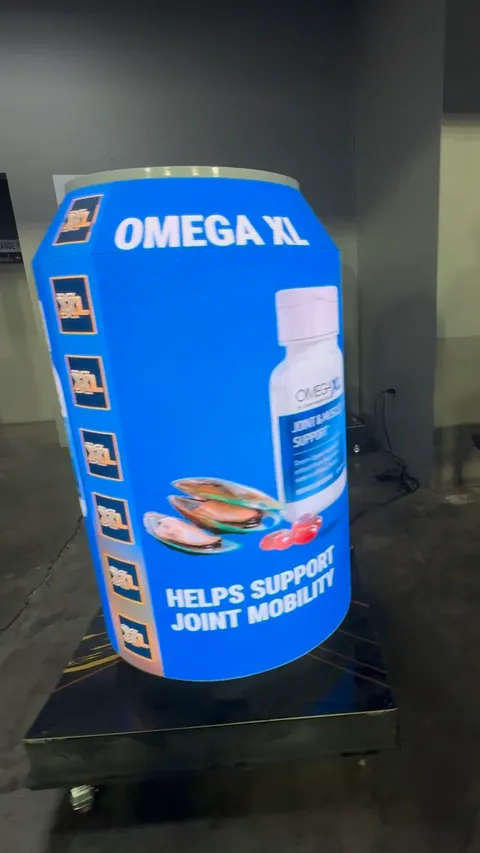 The Timesquare LED barrel, the LED beer can screen, wrapped in a blue OmegaXL ad that reads from every side
