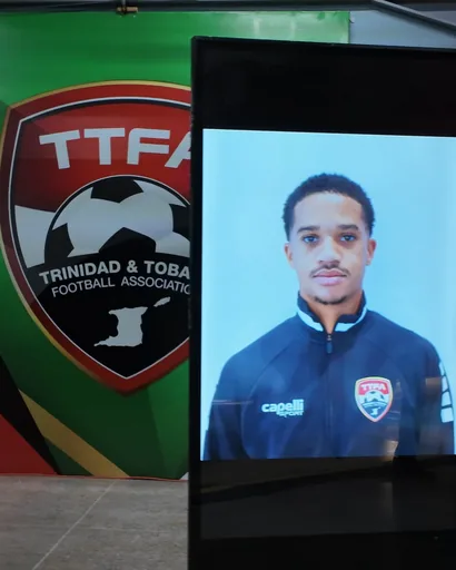 Timesquare vertical touchscreen kiosk showing a T&T player portrait beside the Trinidad and Tobago Football Association crest