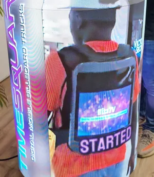 Close view of a lit Timesquare LED can running Timesquare Digital Mobile Billboard Trucks creative, with an LED backpack on screen