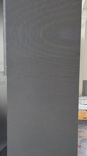A single Timesquare P2.5 LED panel, switched off, standing on its black weighted base with castors